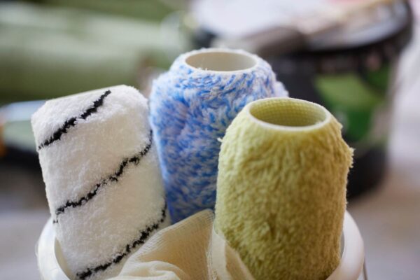 Roller fabric guide